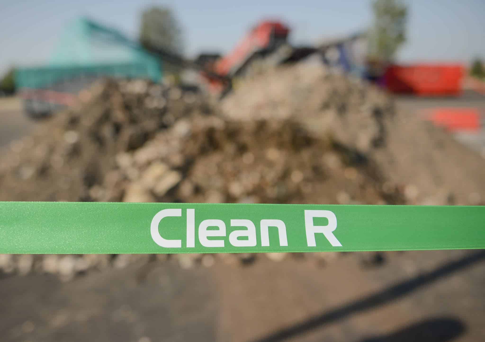 Zaļa lenta ar Clean R logo
